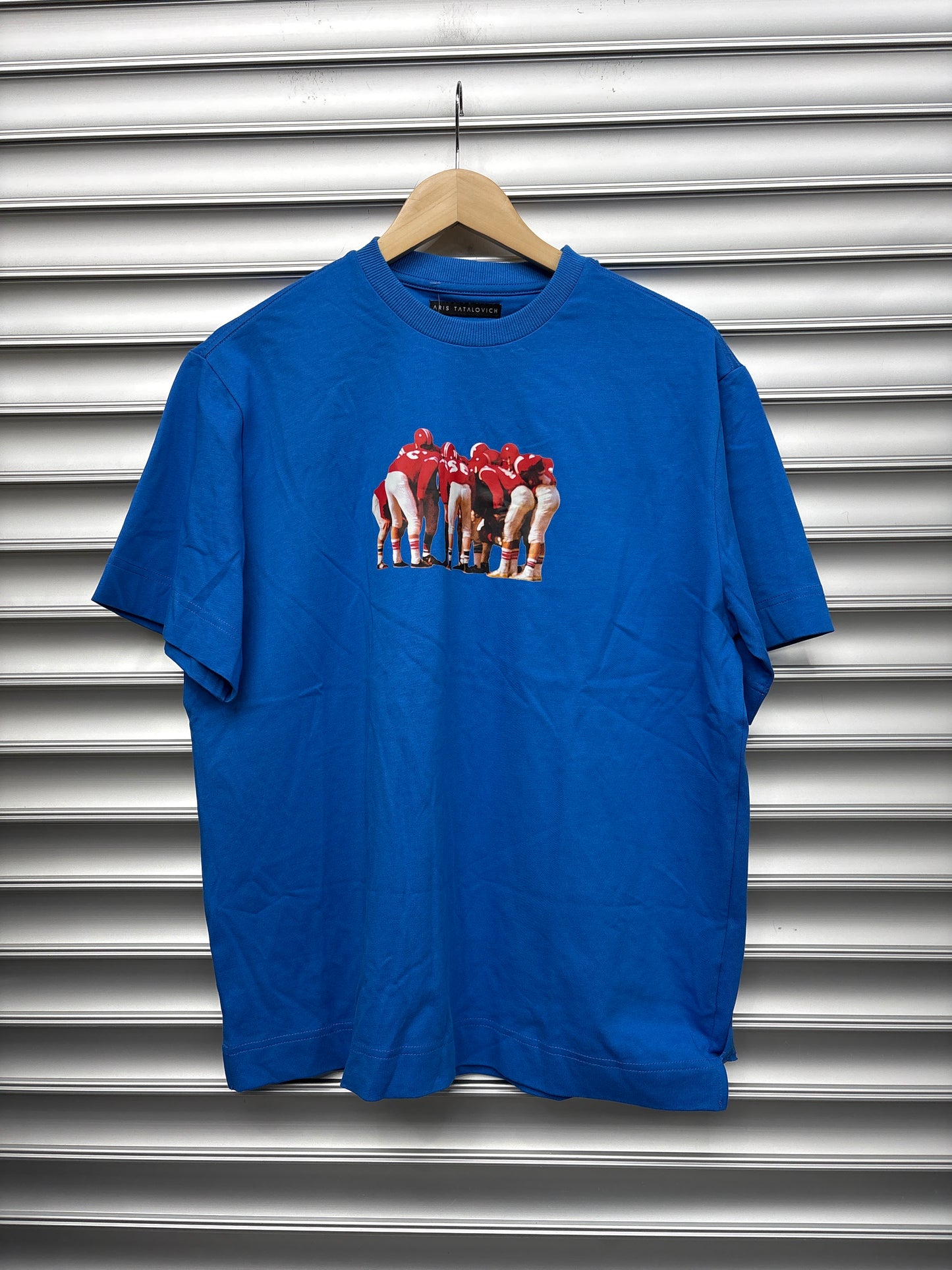 Aris Tatalovich Blue Football Tee - L**
