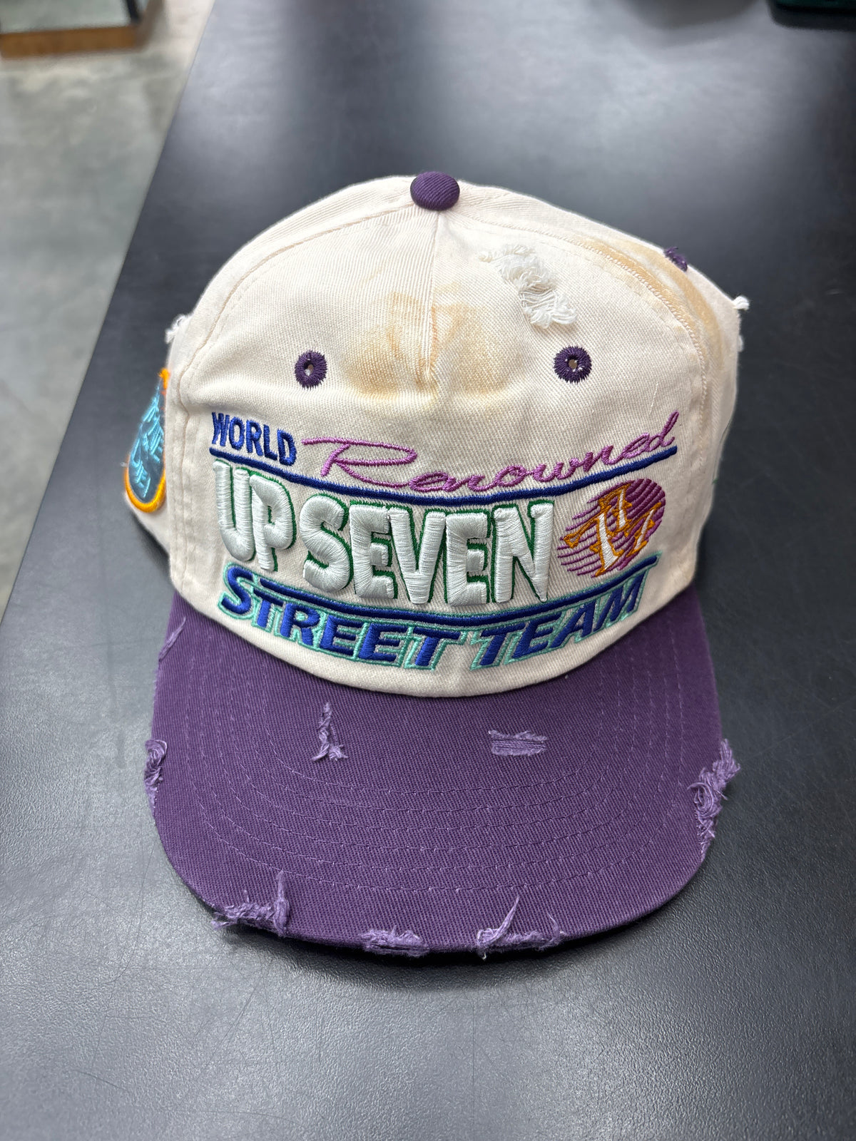 Up 7 Tan/Purple Hat